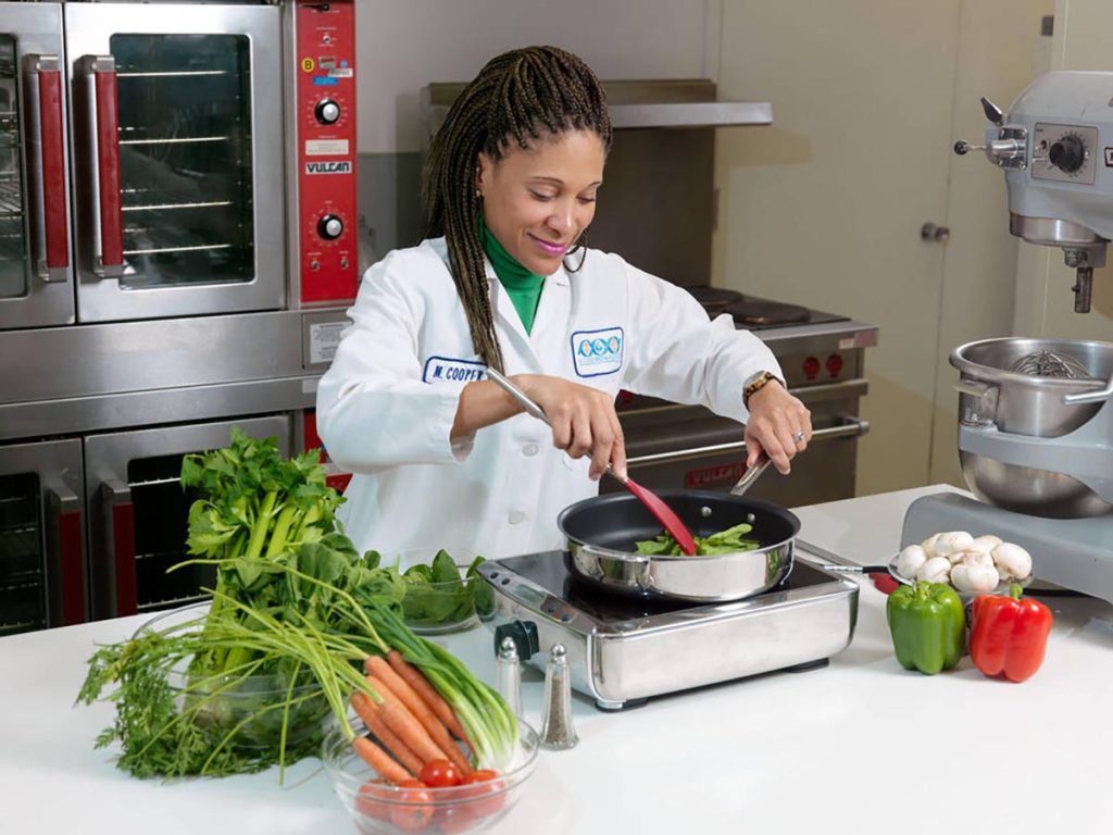 Maya Cooper, Sr. Research Scientist for JSC Space Food Systems Laboratory working and posing for a profile article in O Magazine.  Photo Date: November 28, 2011.  Location: Building 17, JSC Food Lab.  Photographer: Robert Markowitz